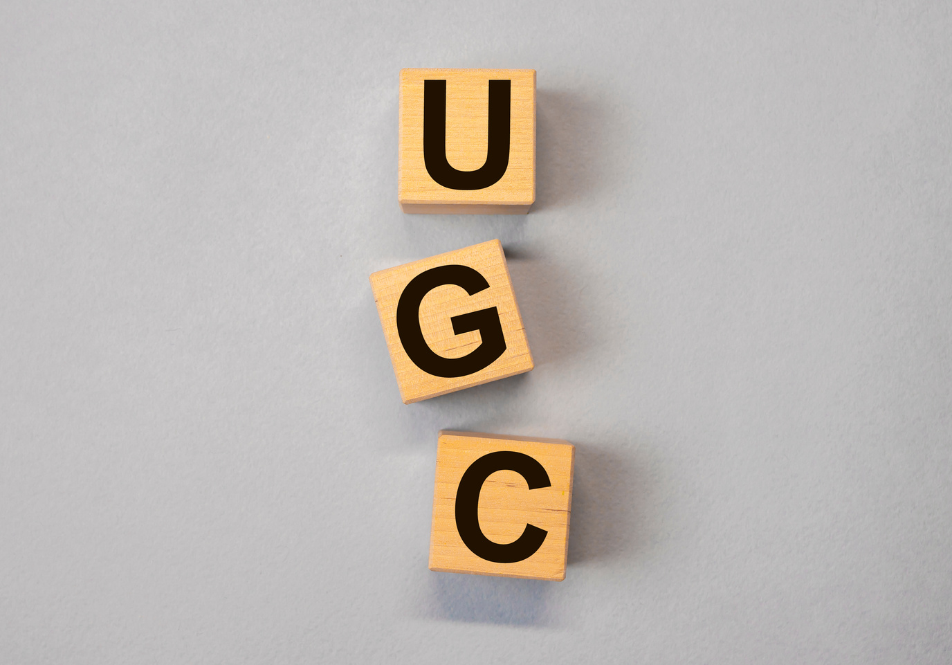 UGC Content Acronym for Social Media on Grey Background